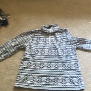 This is a navy blue and white pattern long sleeves very soft and fuzzy